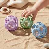 Balle hochet sensorielle en silicone verte - Little L