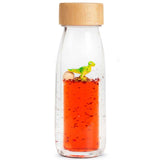 Bouteille sensorielle - Move bottle T-rex - Petit boum