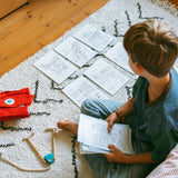 Enfant découvrant les dessins Héros du quotidien de la recharge Kidydraw Pad Kidywolf
